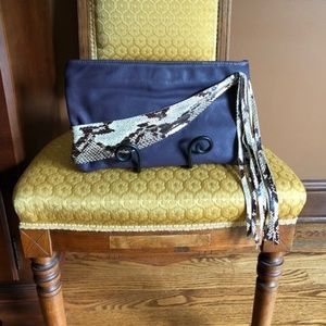 Annie Leather Clutch in Purple with Snakeskin Embossed Leather Tassels